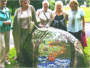 KD Grammar School Year and a group of service users and volunteers from Chorlton Good Neighbours have been working together, designing a Mosaic as part of an Intergenerational Project, funded by Whalley Range U Decide. The wonderful finished Mosaic is now on display in Alexandra Park. 
